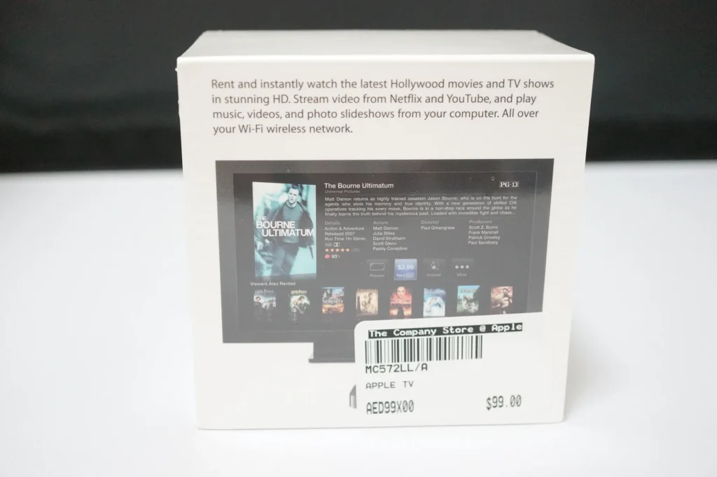 Apple TV 外盒背面，價格貼紙寫著 The Company Store @ Apple、MC572LL/A、$99.00